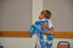 Mary Bowman, loving the quilt made by Margie Mitchell