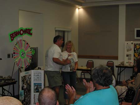 28 Ed awarding Margie Mitchell the Coastal Angler subscription