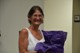 Sherry Havard, raffle winner of the glass ball.